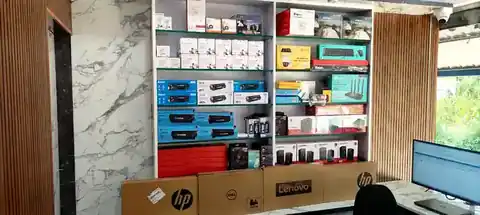 Real interior display at Ultimate Computers in Kumta showing computer supplies and accessories