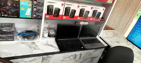 Actual shop display of speakers, Wi-Fi networking equipment and computer accessories at Ultimate Computers